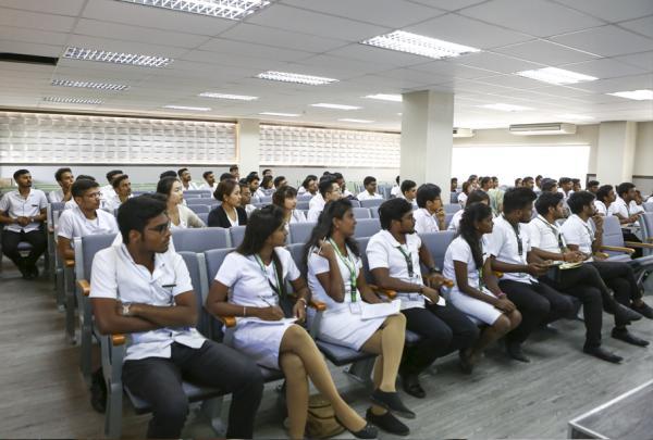Indian medical students during an orientation session in a lecture hall