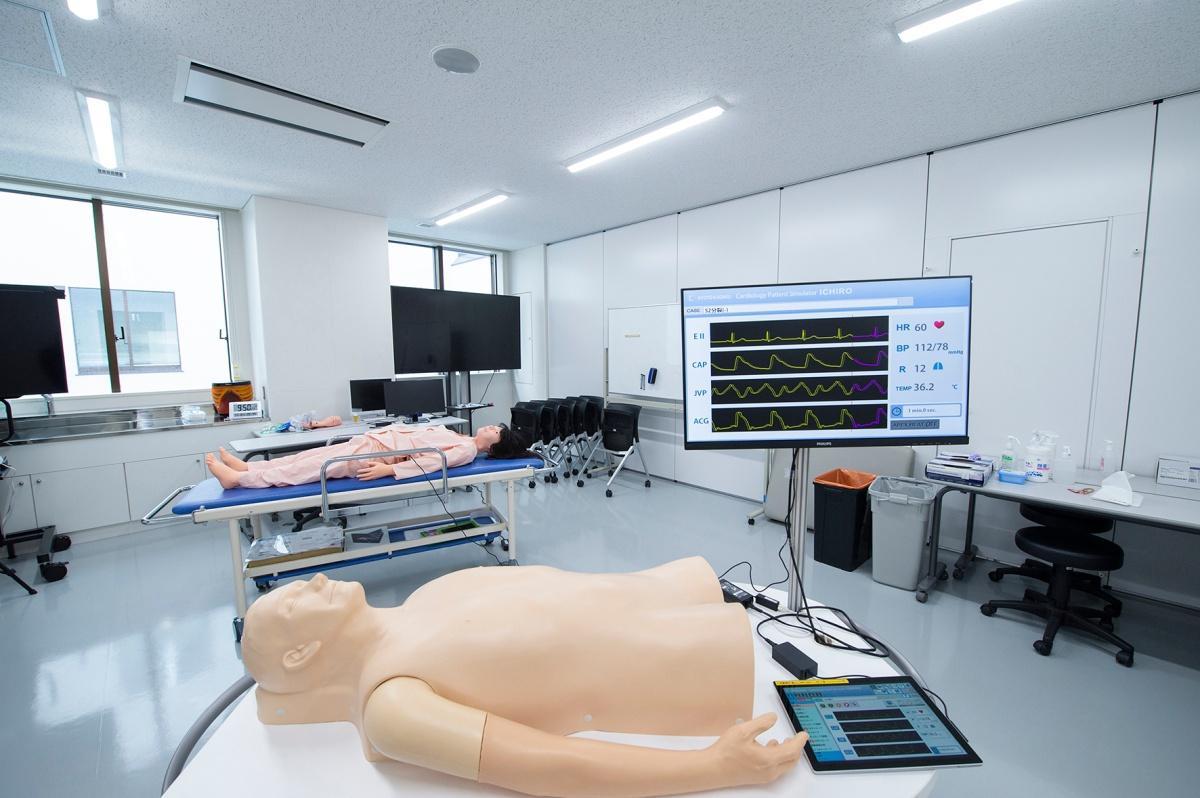 Medical simulation lab with patient monitoring equipment used for clinical training